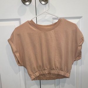 Cropped shirt, cinches at the waist, pink